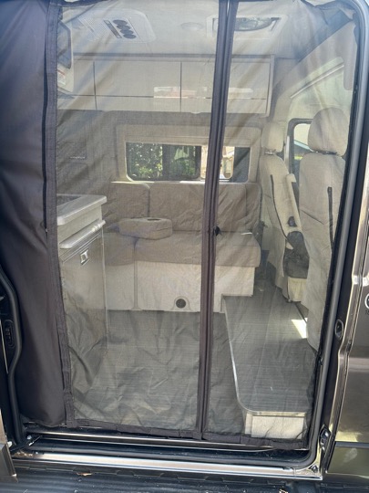 Sliding door entrance with bug screen