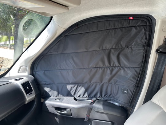 Passenger's side window with blackout shade from Wanderful